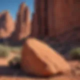 A majestic red rock formation in the Southwest under a clear blue sky