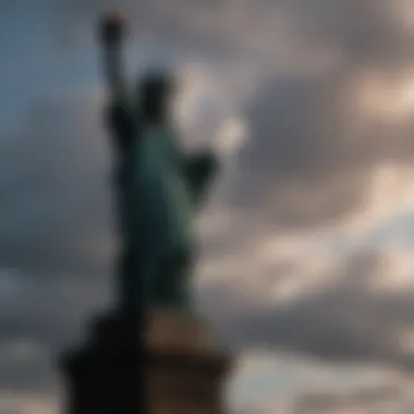 Silhouette of Statue Against Dramatic Sky