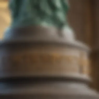 Close-up of the inscription on the pedestal of the Statue of Liberty, highlighting the dedication to freedom.