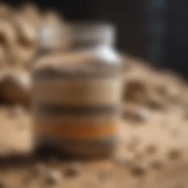 A clear container showing layers of sand and gravel used for filtration