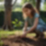 A child planting a tree sapling in a garden